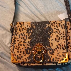 Sharif lionhead doorknocker handbag